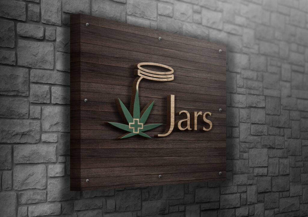 A wooden sign with a logo with a mason jar and the medical cannabis sign and the word Jars against a wooden sign