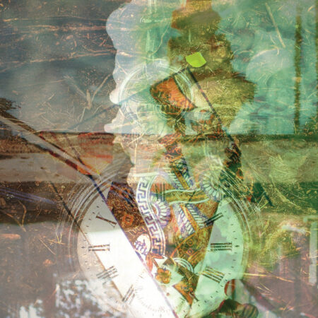 A blurry image of a man reflected in a mirror with a pocket watch and a playings are falling behind him.