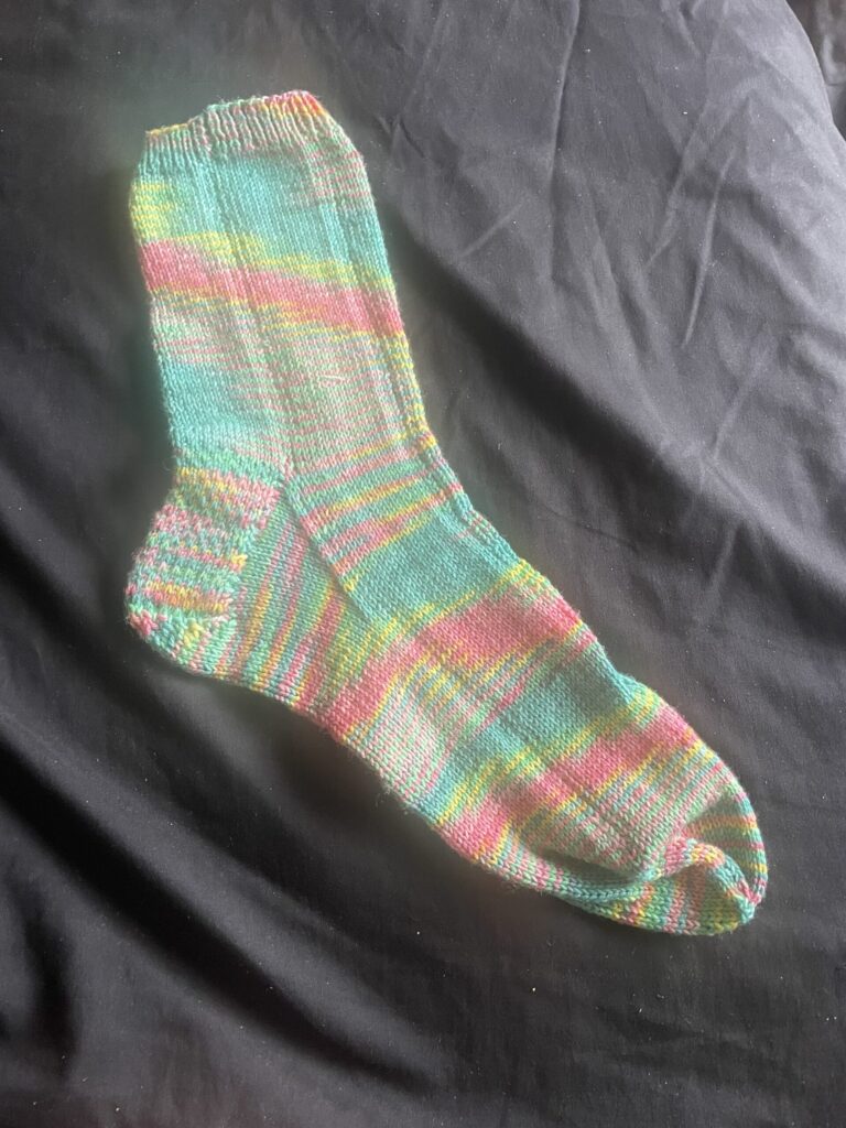 Barber stripes of yellow and blue and pink socks